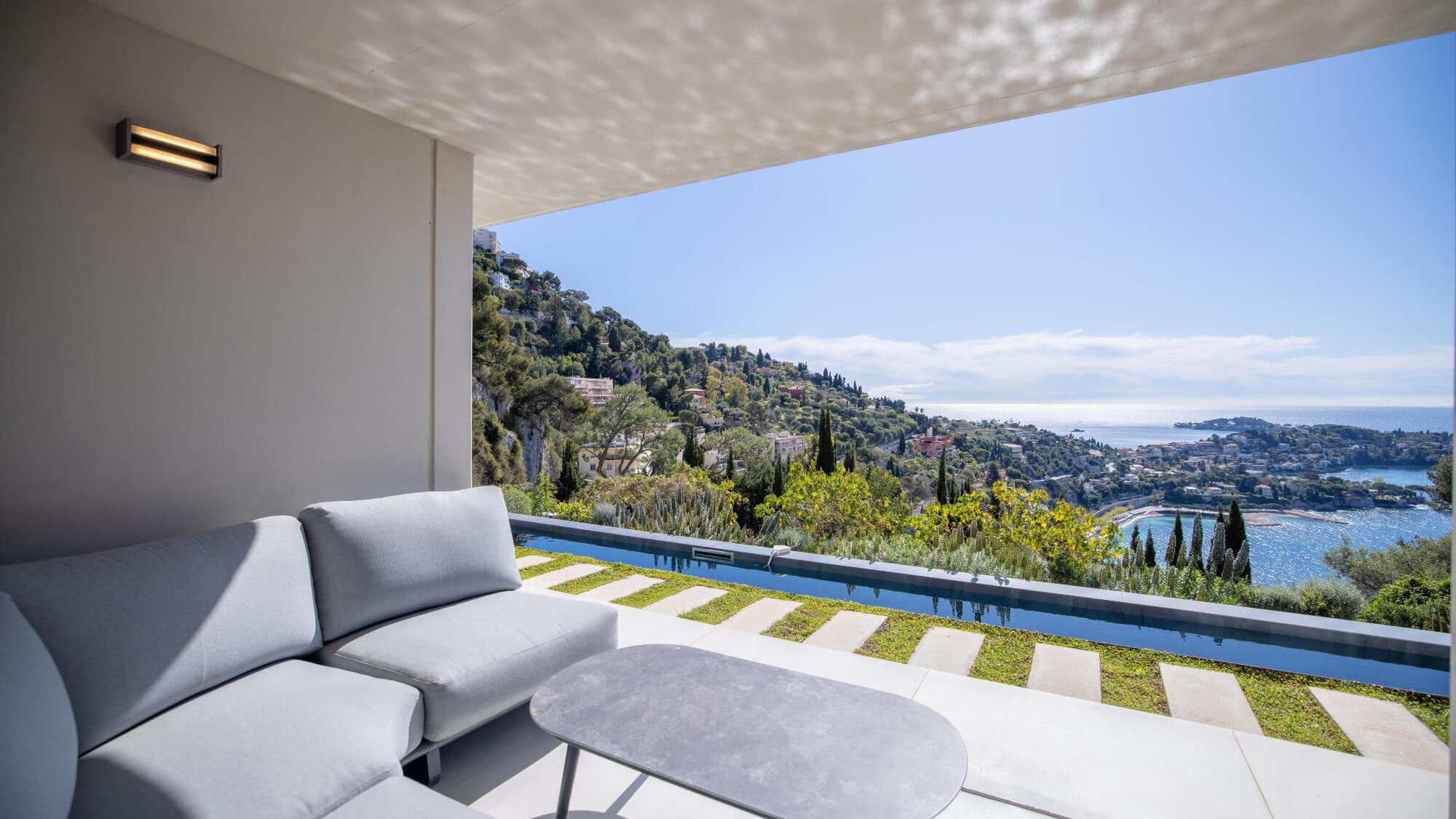 Exterior view of private pool and Mediterranean Sea from one of the Vista Magnifika luxury villas.